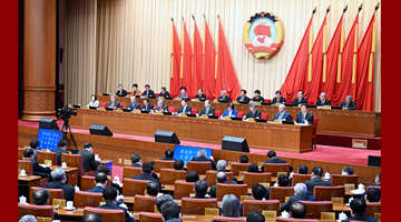 全國政協十四屆常委會第一次會議閉幕 王滬寧主持并講話